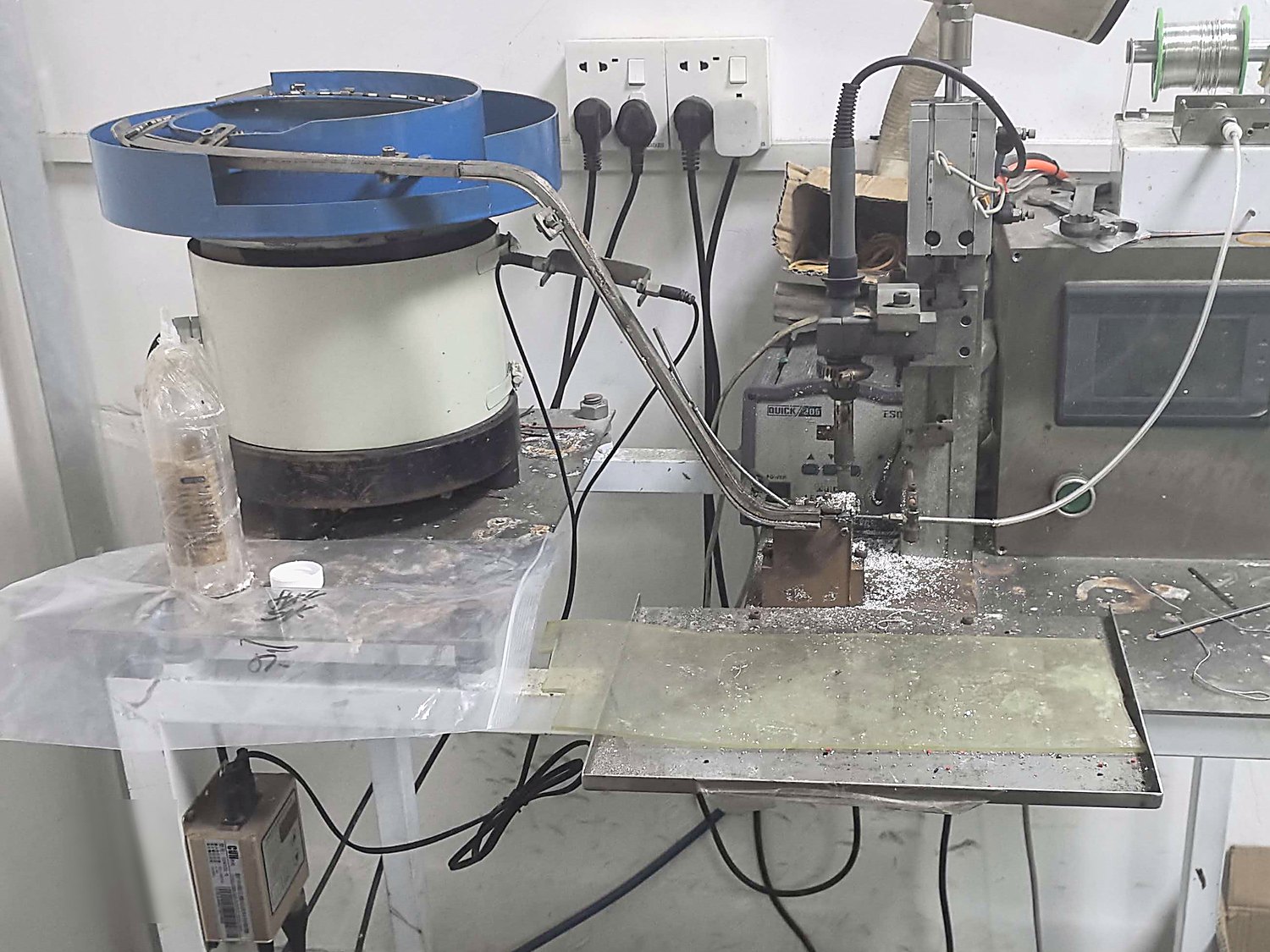 Semi-automatic wire soldering station at HSC's partner line in Tai'an